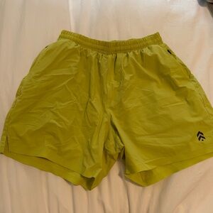 Barry’s Boot Camp neon green shorts